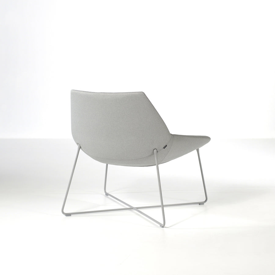 Inclass Dunas XL,  Low Back Rod Base Armchair, back turned, © Spencer interiors Inc.