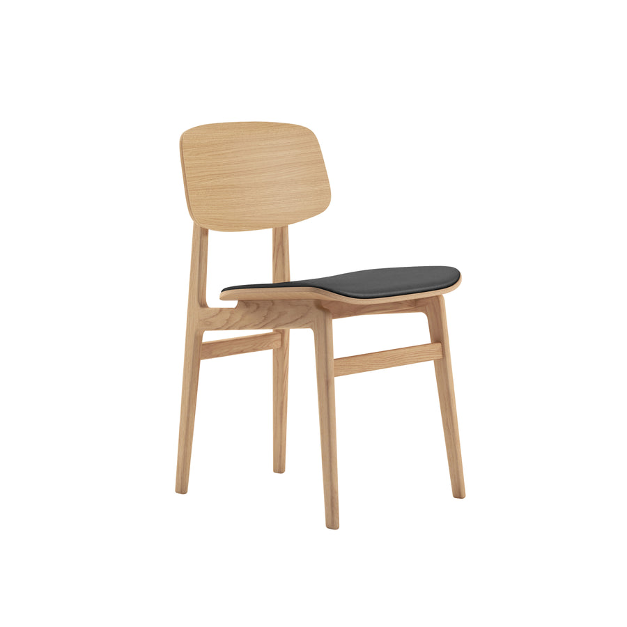 Norr11 Denmark, NY11 Dining Chair Natural Oak, Black Leather, front turned | Spencer Interiors