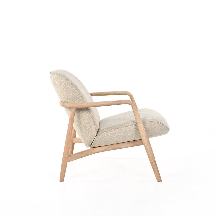 BOLIA Bowie Armchair in White Pigmented Oak, Ocean Sand, profile view. ©Spencer Interiors Inc.