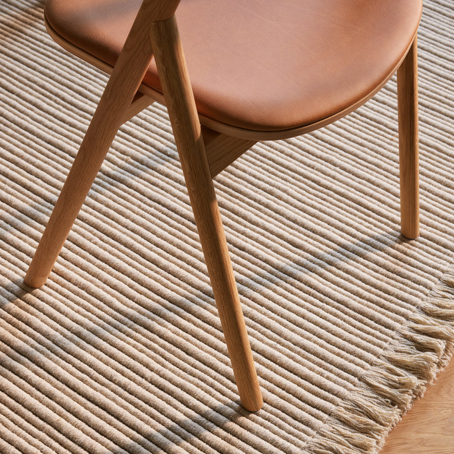 BOLIA Fenri Dining Chair in Oiled Oak, ambient setting, leg detail