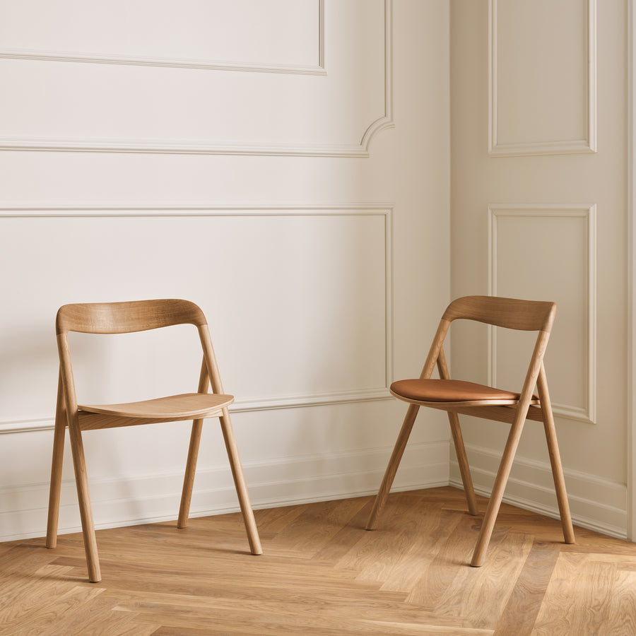 BOLIA Fenri Dining Chair in Oiled Oak, wood and leather seats, ambient setting