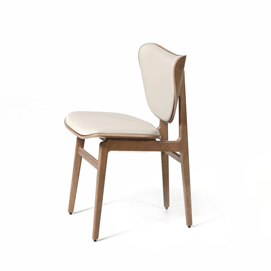 NORR11 Elephant Dining Chair in Light Smoked Oak, profile turned, ©Spencer Interiors Inc.