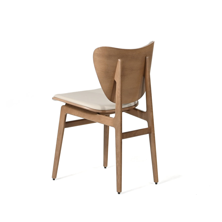 NORR11 Elephant Dining Chair in Light Smoked Oak, back turned, ©Spencer Interiors Inc.