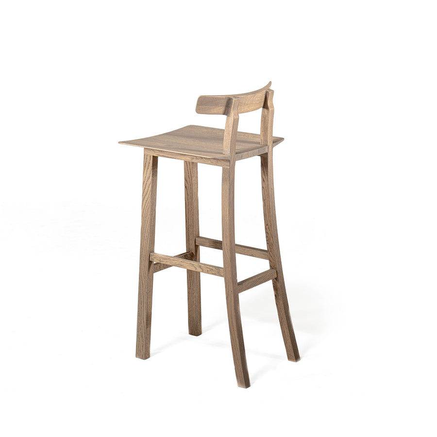 WOAk Nervosa Stool in solid wood, back turned