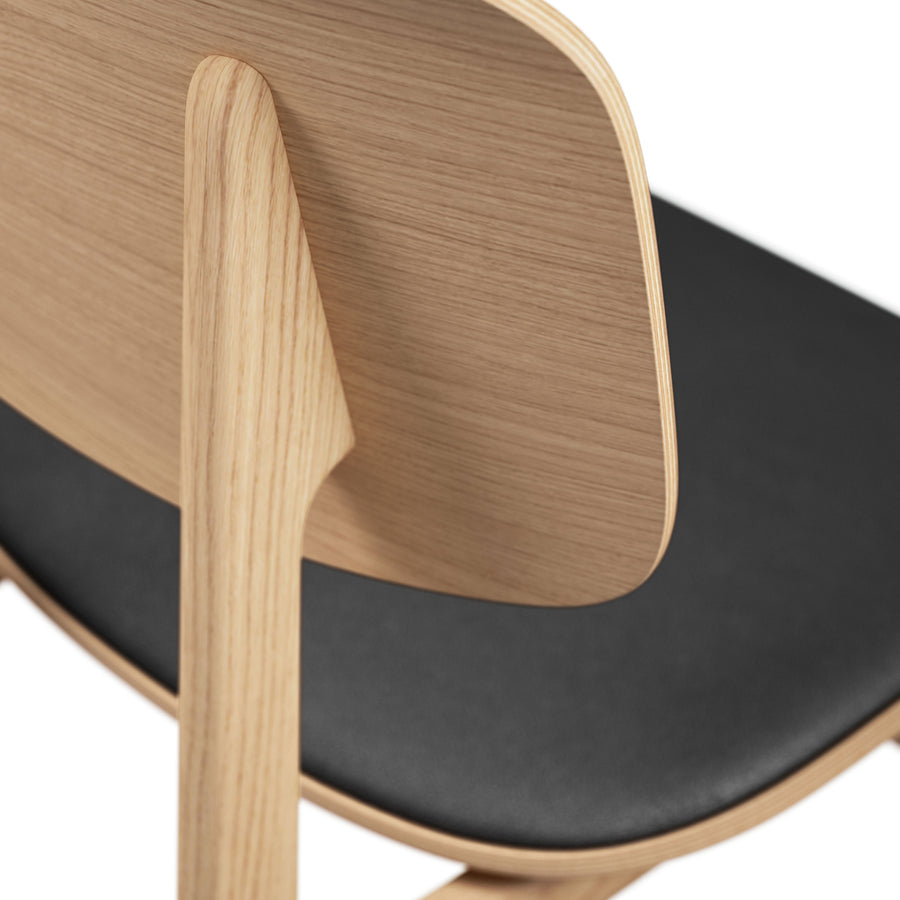 Norr11 Denmark, NY11 Dining Chair Natural Oak, Black Leather, detail | Spencer Interiors