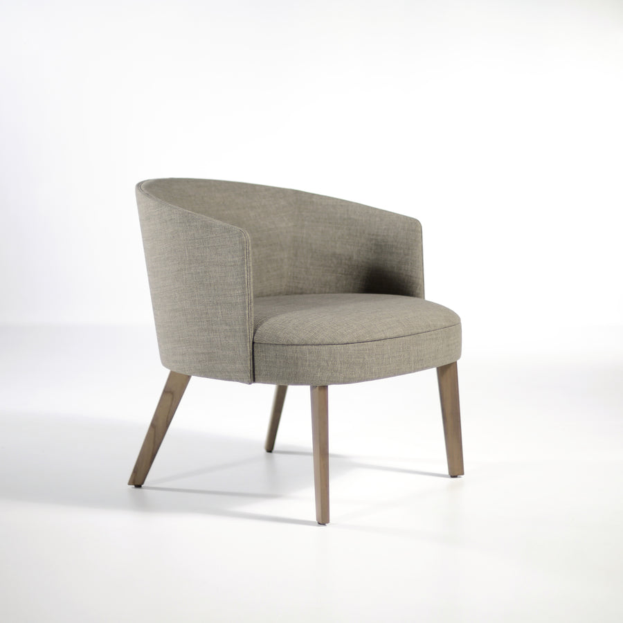 Potocco Lena Lounge Armchair in fabric Bold Grigio, profile turned | © Spencer Interiors