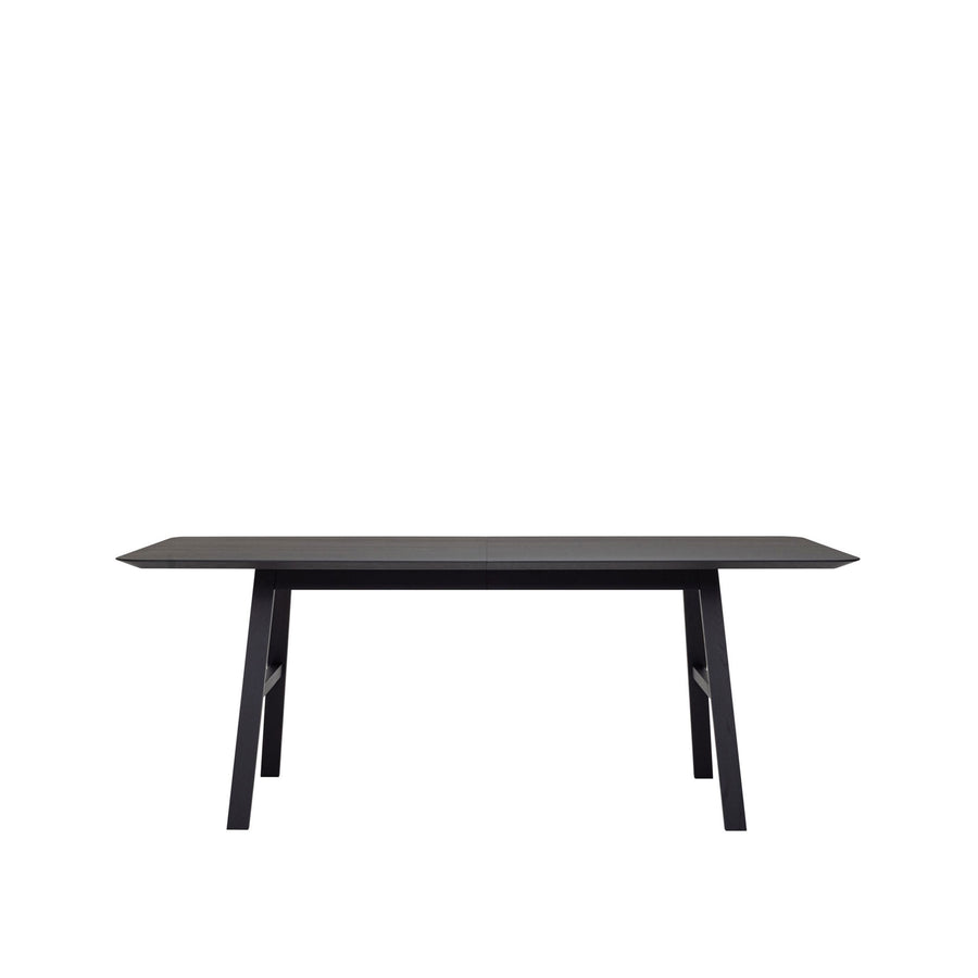 WOAK Malin Extension Table in solid Black Oak, side view